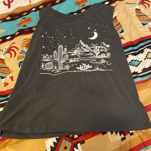 Tank top. Graphic, medium, good condition.